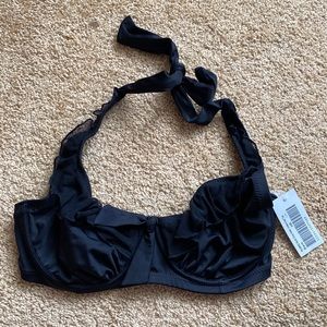 Black bikini top new with tags. Size 32E, ties around neck